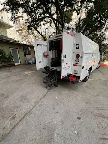 Magnet Plumbing service vehicle on-site for Grease Trap Cleaning in Alice Winter Gardens