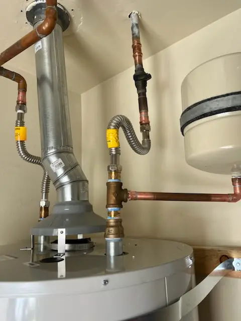Water heater installation and plumbing repair in Alice Winter Gardens